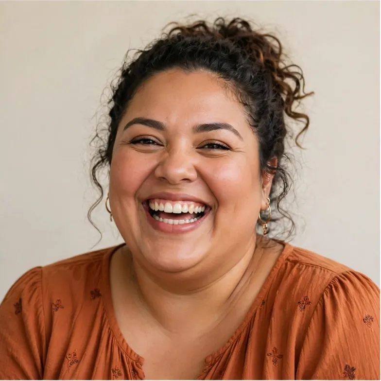 Portrait of a joyful plus-size woman laughing