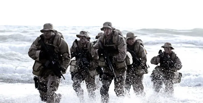 A team wading ashore together, on a mission
